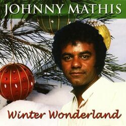 We Need A Little Christmas by Johnny Mathis